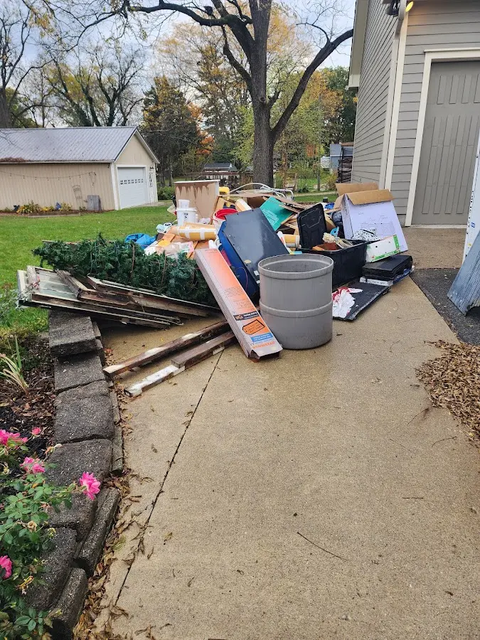 Dumpster being loaded with debris for 30 Yard Dumpster Rental in Allegheny